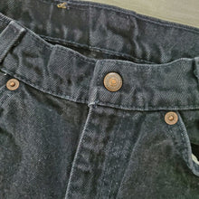 Load image into Gallery viewer, Vintage Levi's black 550 fit jean shorts 23 inch waist