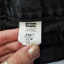 Load image into Gallery viewer, Vintage Levi's black 550 fit jean shorts 23 inch waist