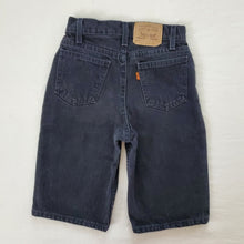 Load image into Gallery viewer, Vintage Levi's black 550 fit jean shorts 23 inch waist
