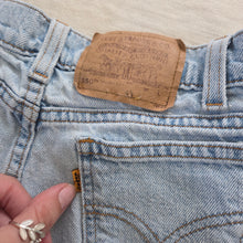 Load image into Gallery viewer, Vintage Levi&#39;s 550 Fit Cutoff Jean Shorts Orange Tab kids 12 (24 inch waist)
