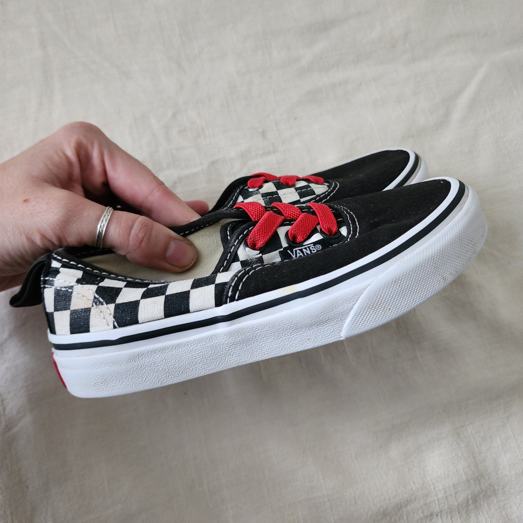 Black and red checkerboard vans with laces sale